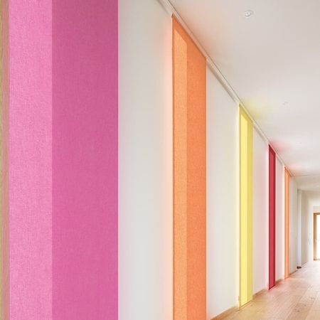 Flächenvorhänge und Vertikalanlagen